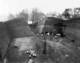 Old black and white photo of megaliths under the South Mound excavated in 1941. Photo: the National Museum.
